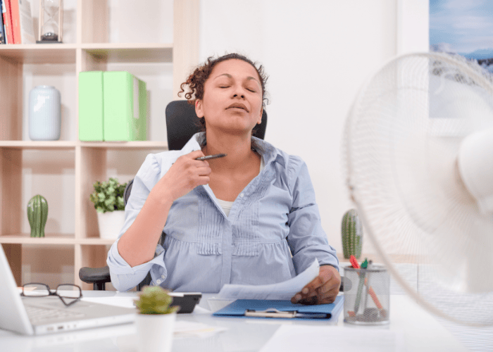 Woman too warm inside her home